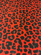 Lycra Maculato Animalier Rosso - WorldTessuti