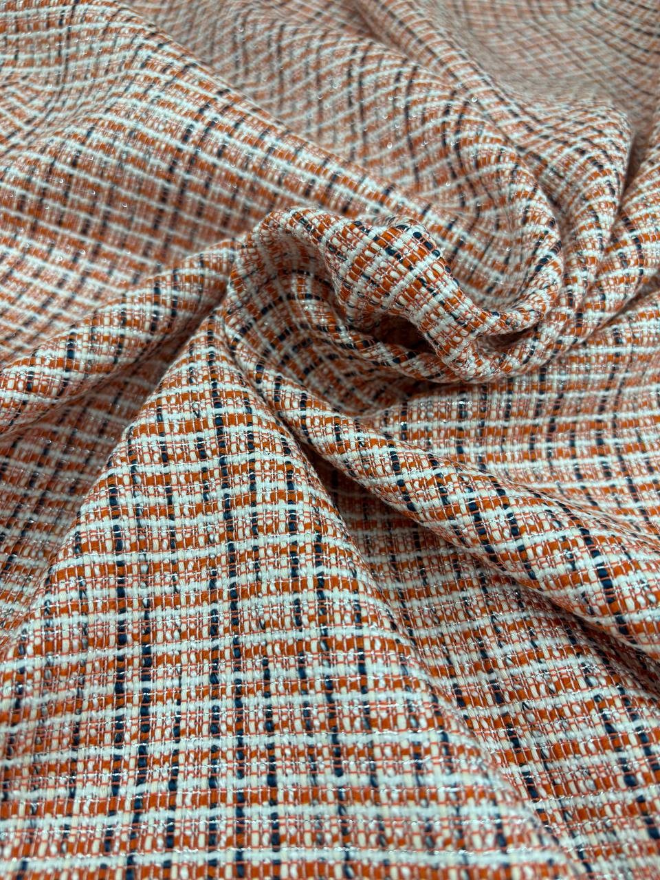 Tweed Bouclè Tipologia Chanel laurent Arancio