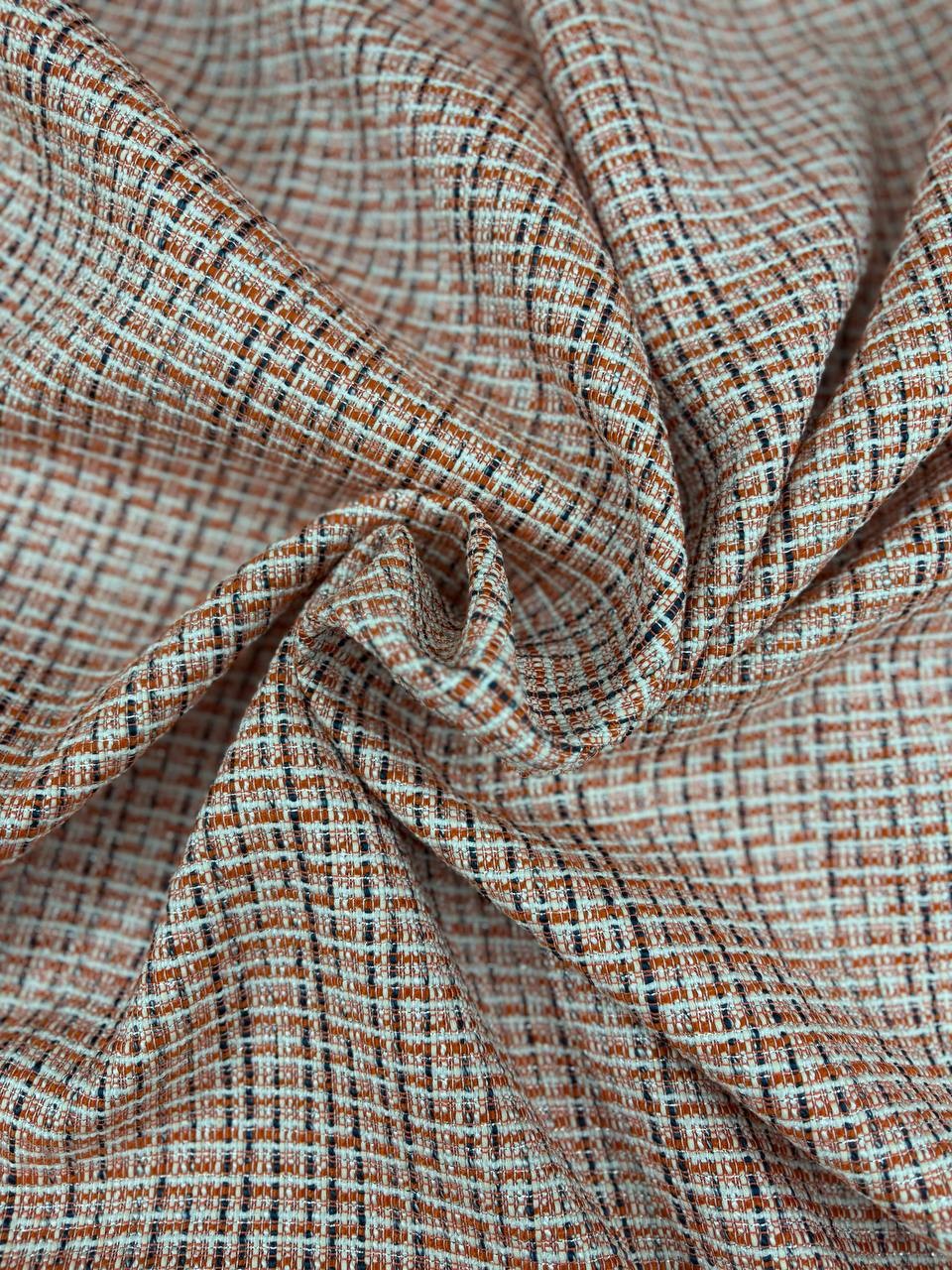 Tweed Bouclè Tipologia Chanel laurent Arancio