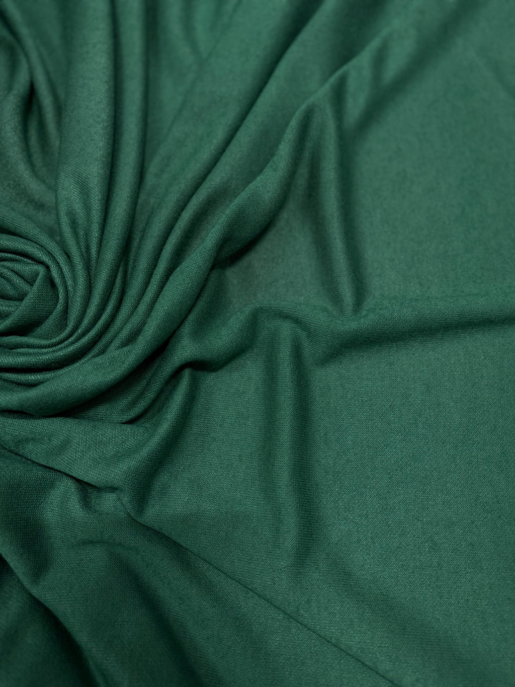 Tessuto maglia mano cashmere color verde abete