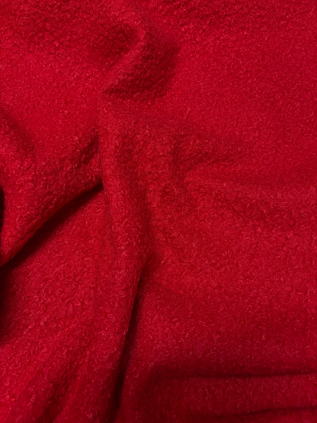 Tessuto Boucle rosso Ricciolino