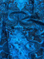 Lycra astratto caleidoscopico blu
