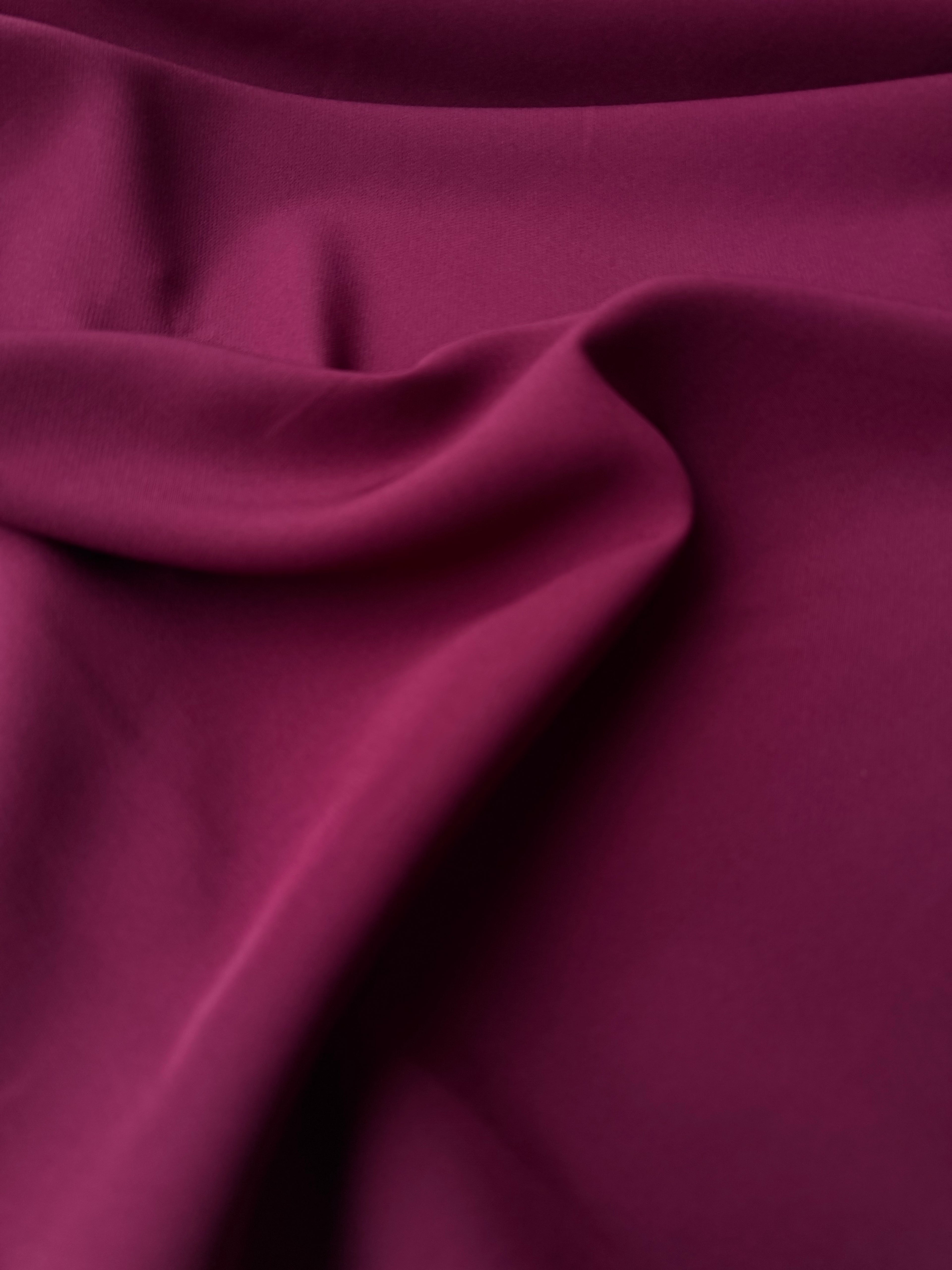 Tessuto crepe elastico vinaccia per capi aderenti