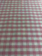 Dettaglio trama tessuto cotone quadri rosa classico tinto in filo