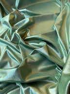 Tessuto lycra milleluci verde, elasticizzato e brillante con effetto acqua, perfetto per costumi da danza