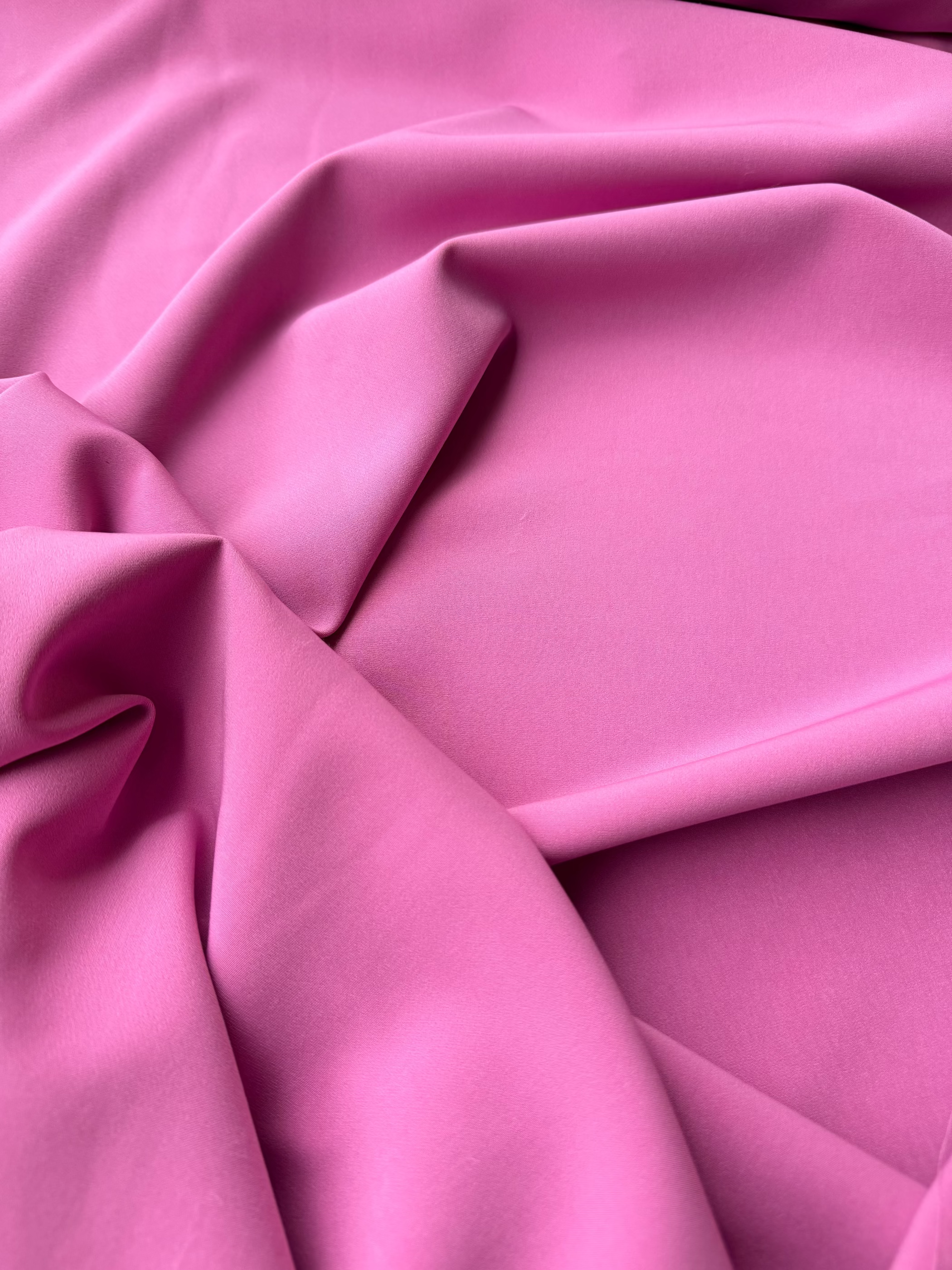 Tessuto cady tecnico elasticizzato rosa big bubble per abiti da sera