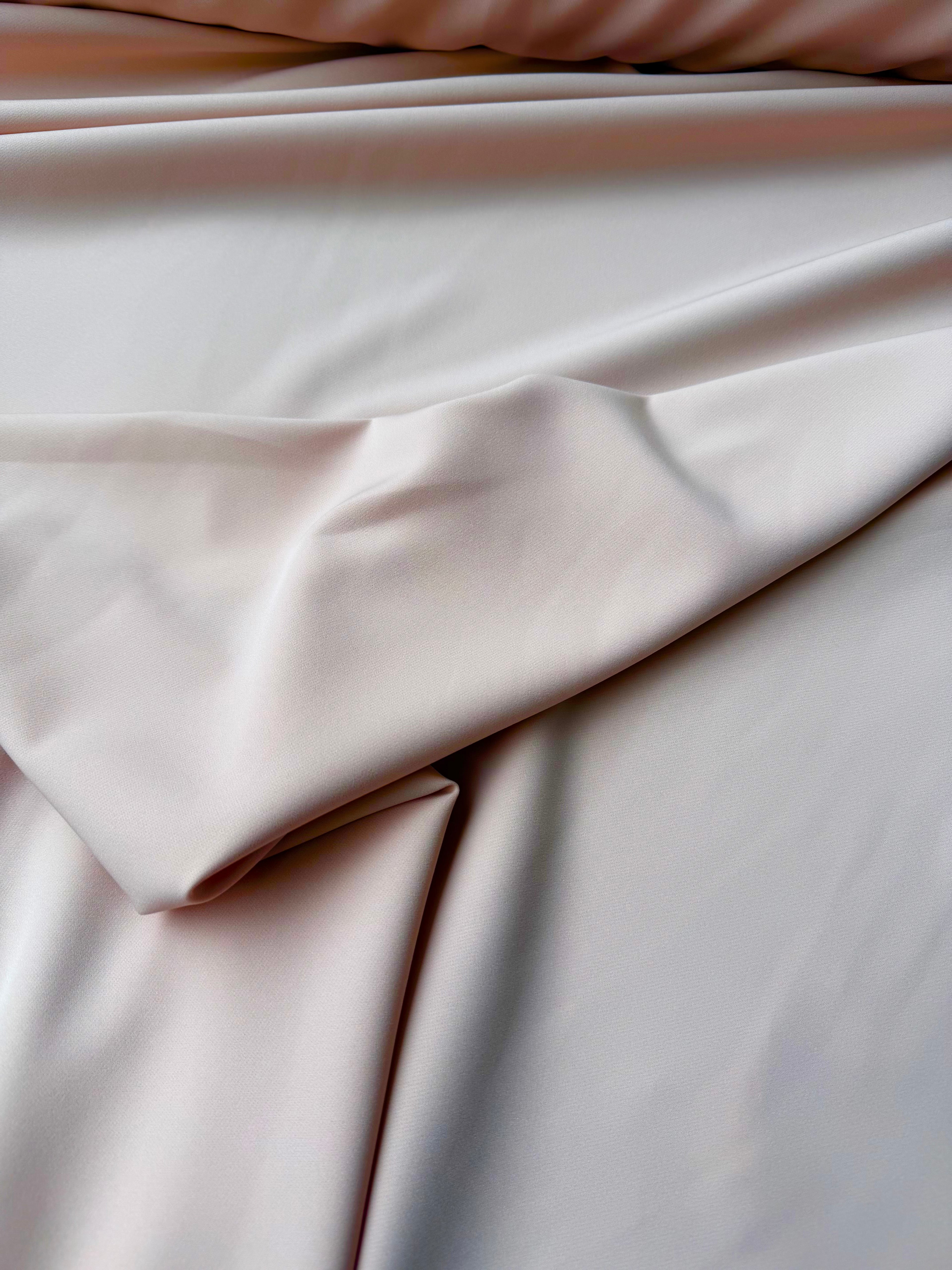 Tessuto cady elastico rosa carne per abbigliamento professionale e ufficio