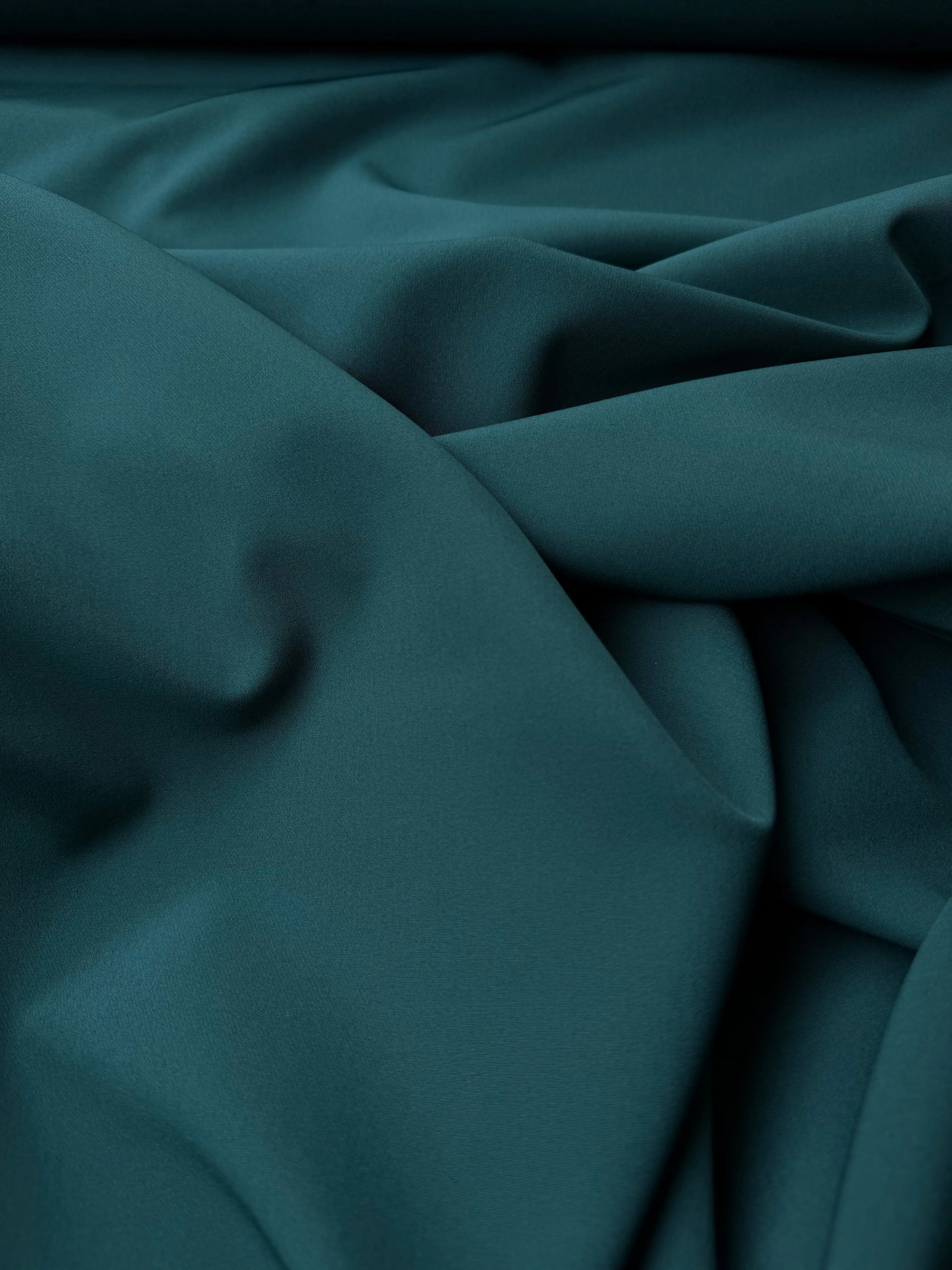 Tessuto cady elastico verde bottiglia per giacca e pantalone sartoriale