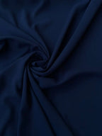 Tessuto georgette tinta unita blu scuro, leggero e trasparente, perfetto per abiti eleganti e camicie