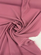 Tessuto georgette tinta unita rosa antico, leggero e trasparente, perfetto per abiti eleganti e camicie