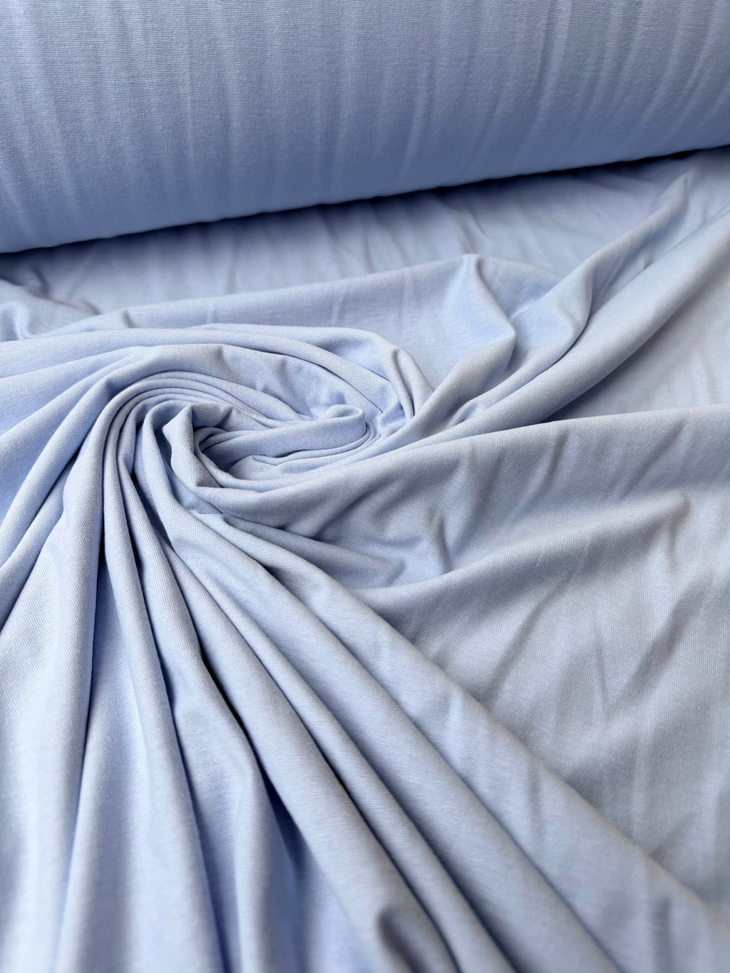 Jersey cotone elastico celeste per abbigliamento sportivo