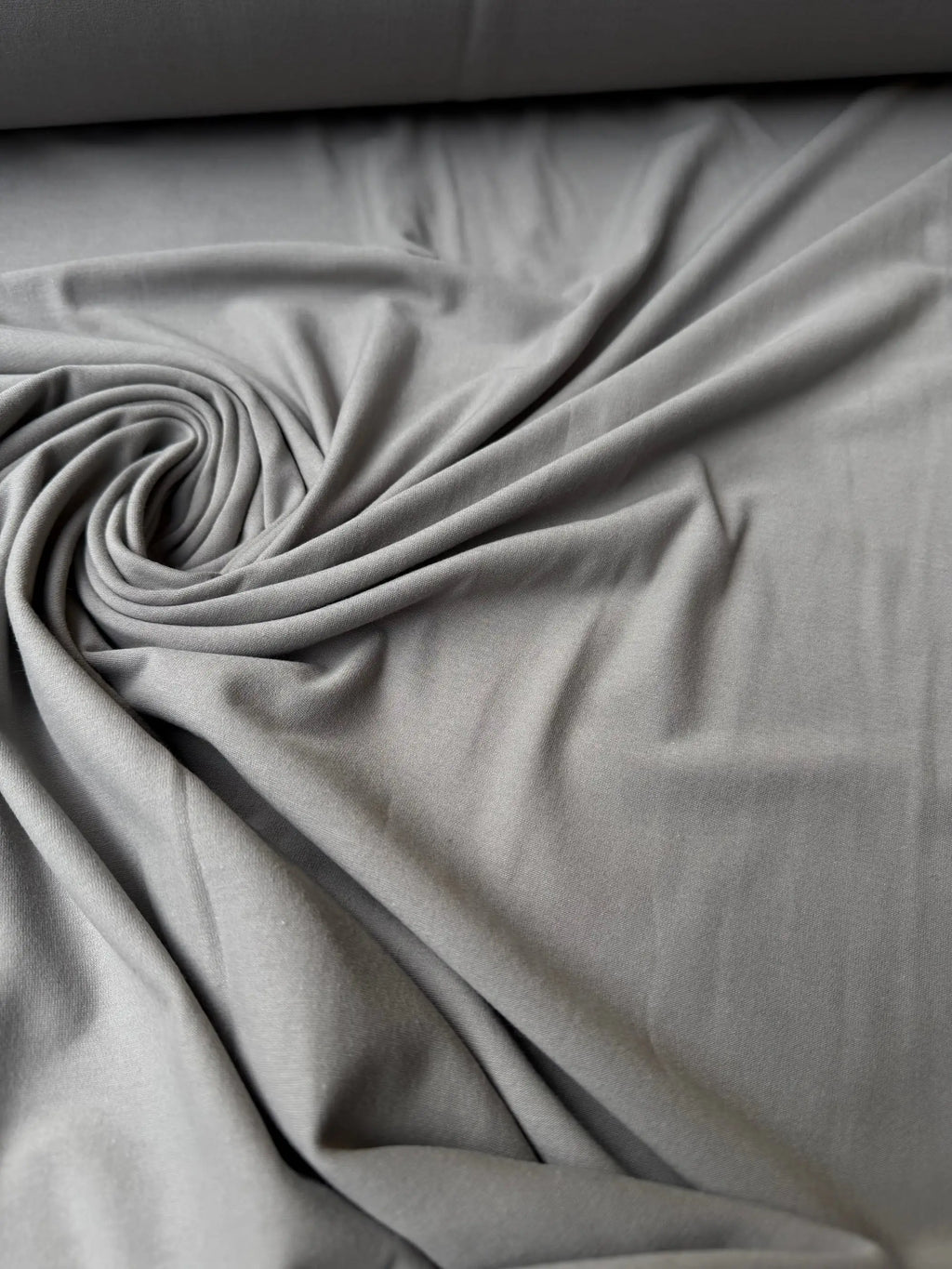 Tessuto jersey cotone elasticizzato grigio medio per leggings e capi aderenti
