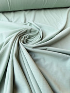 Jersey cotone elasticizzato verde menta per abiti casual e capi comodi