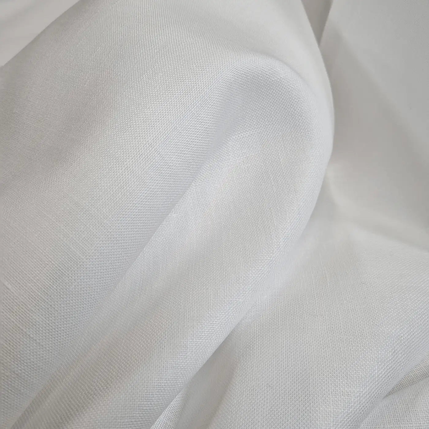 Tessuto doppio lino bianco seta elegante e strutturato, ideale per decorazioni, bomboniere e tendaggi