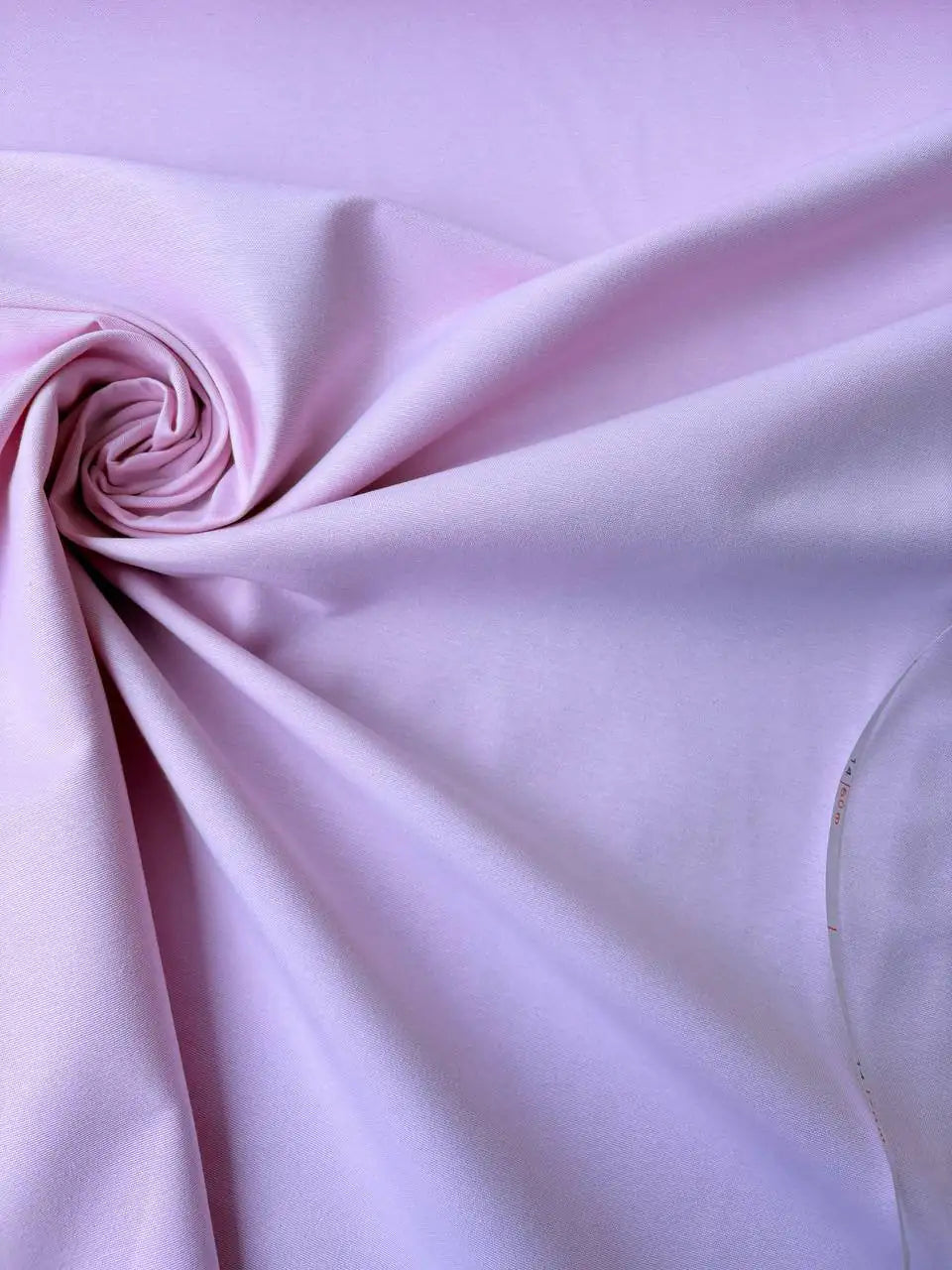 Dettaglio tessuto panama tinto in filo color rosa chiaro, trama panama resistente e colori intensi per arredo tavola e cucina