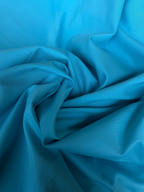 Tessuto Punto Milano celeste, jersey strutturato elasticizzato perfetto per abbigliamento elegante e sportivo