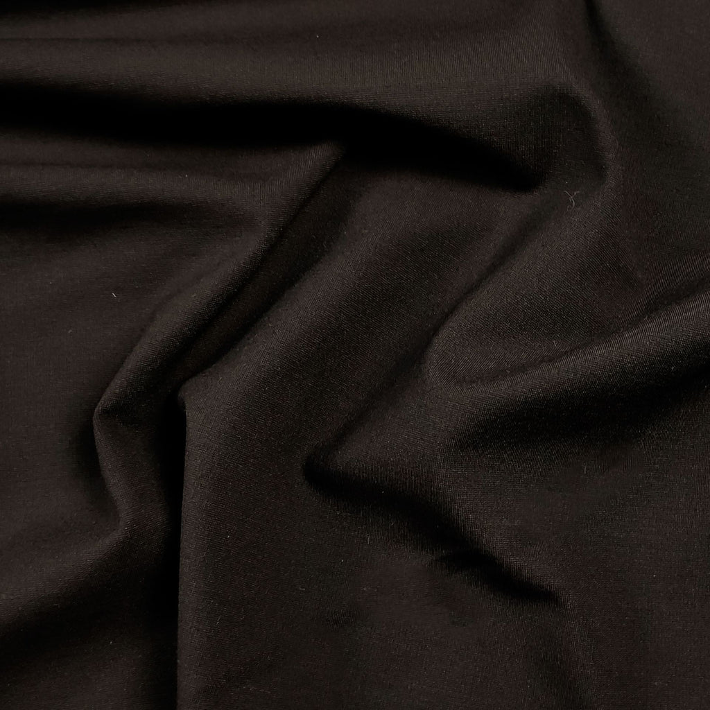 Tessuto Punto Milano marrone, maglia elasticizzata 300 g/m² in viscosa, nylon ed elastan, ideale per gonne, giacche e pantaloni