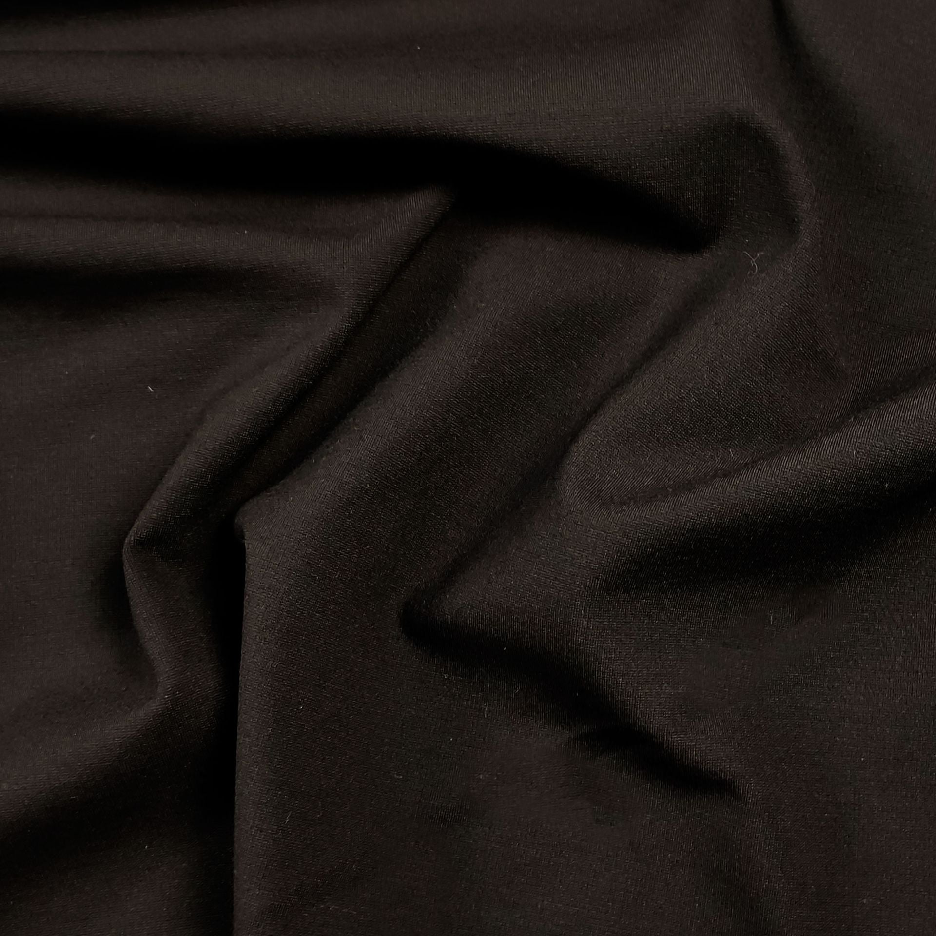 Tessuto Punto Milano marrone, maglia elasticizzata 300 g/m² in viscosa, nylon ed elastan, ideale per gonne, giacche e pantaloni
