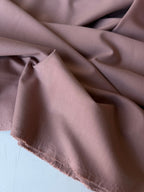 Tessuto Punto Milano rosa antico tradizionale, maglia elasticizzata 300 g/m² in viscosa, nylon ed elastan, ideale per gonne, giacche e pantaloni eleganti