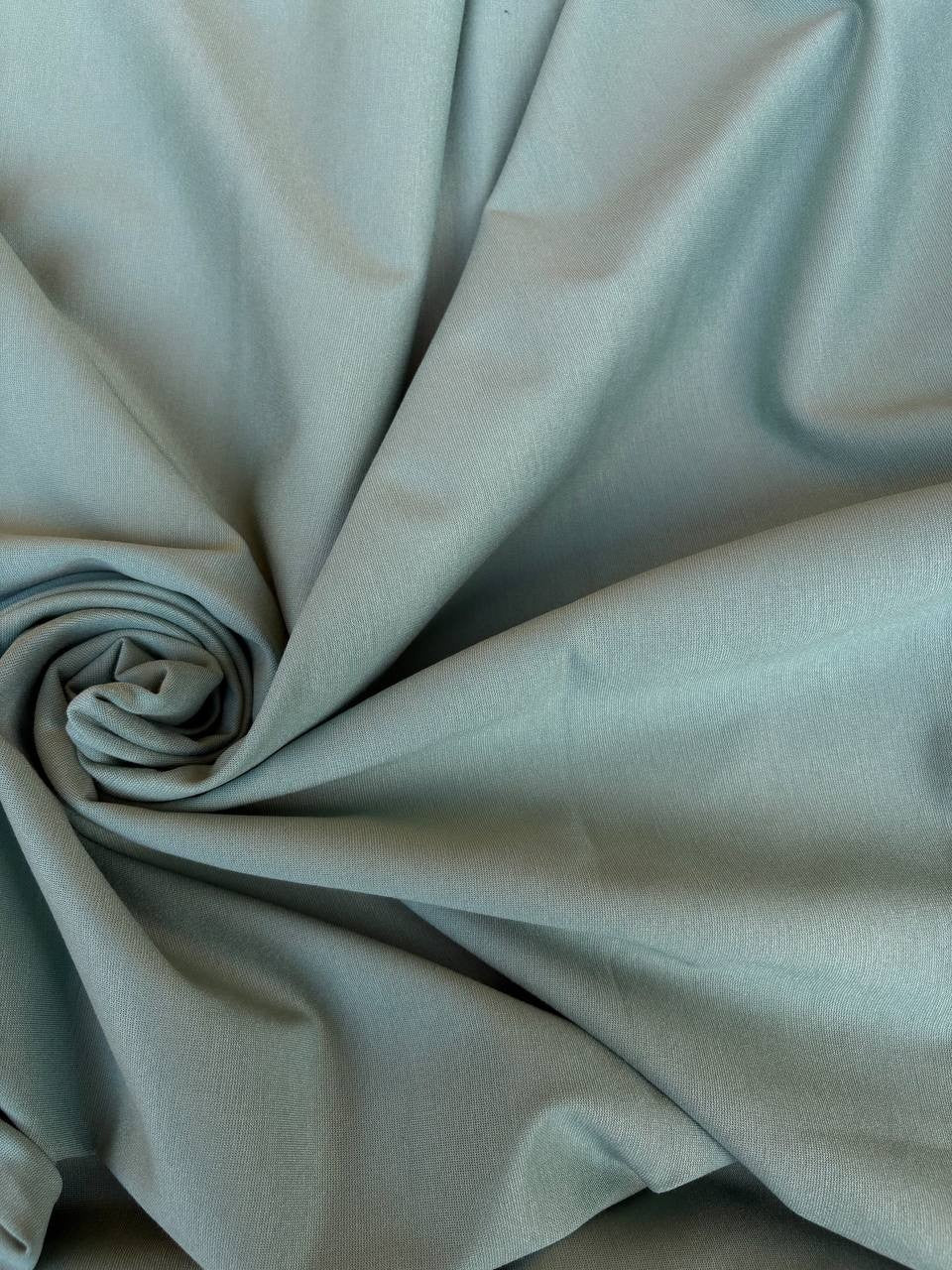 Tessuto Punto Milano verde menta, maglia elasticizzata 300 g/m² in viscosa, nylon ed elastan, ideale per gonne, giacche e pantaloni eleganti